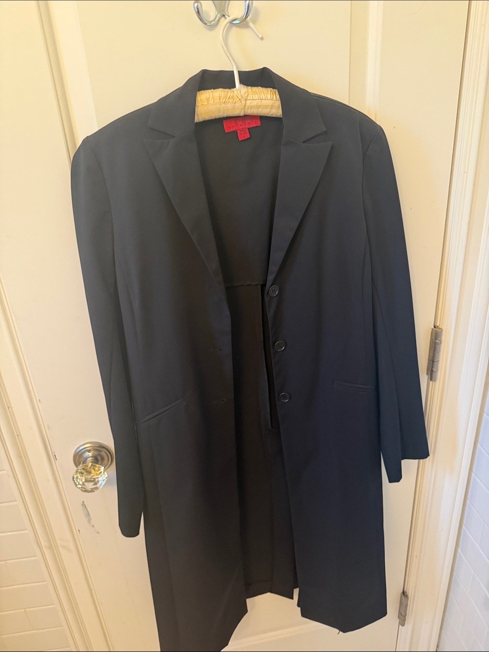 BCBGMaxAzria Black Garment with Red Brand Tag